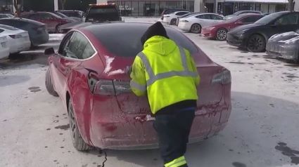 Pushing a frozen Tesla in Chicago.JPG